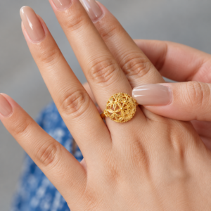 Illustrative decorative gold-tone ring